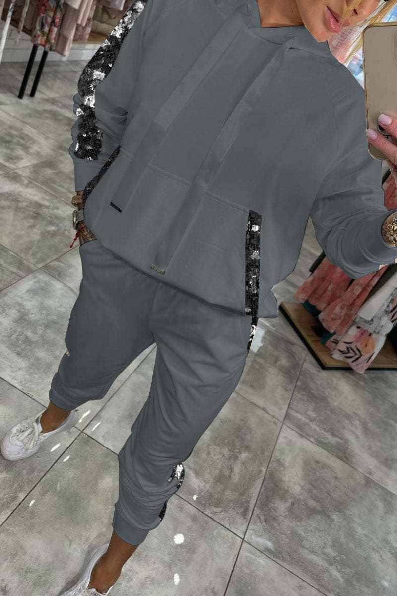 Női kapucnis, hosszú, flitteres, lezser kosztüm