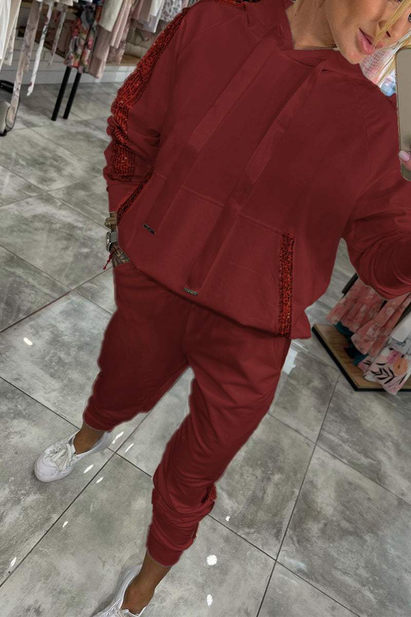 Női kapucnis, hosszú, flitteres, lezser kosztüm