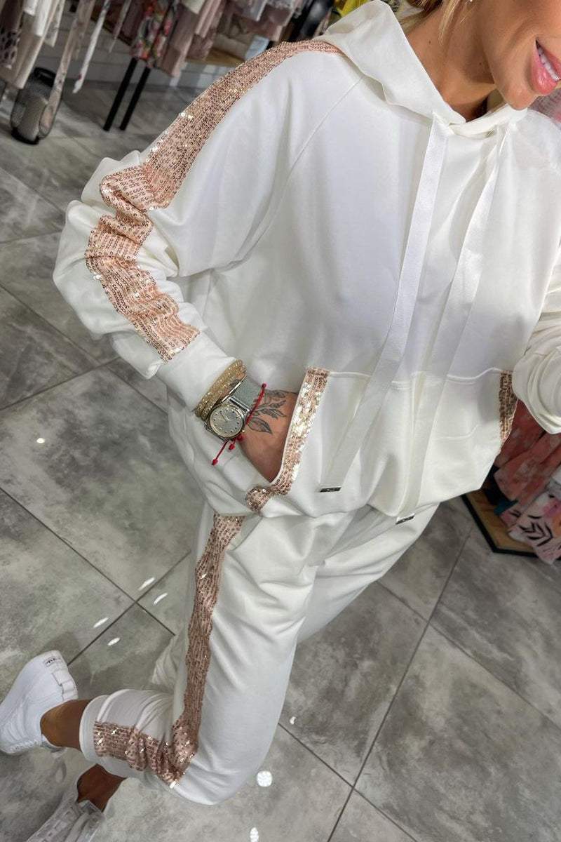 Női kapucnis, hosszú, flitteres, lezser kosztüm