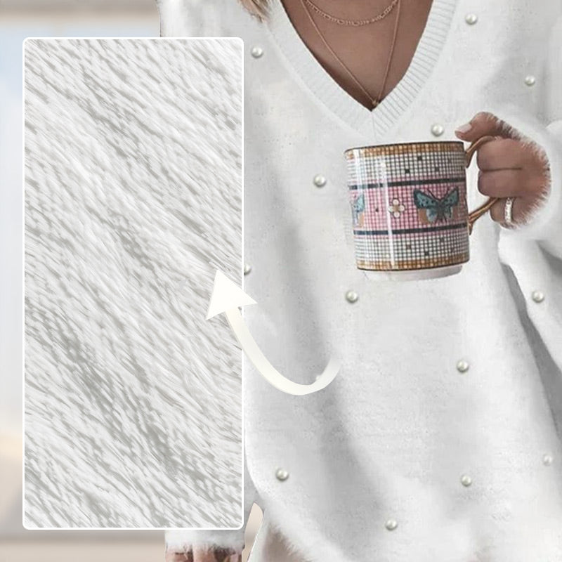 V-nyakú, hosszú ujjú, gyöngyös pulóver