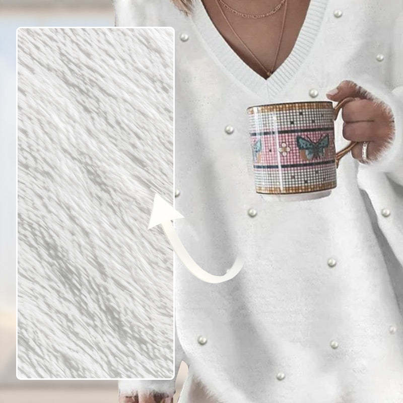 V-nyakú, hosszú ujjú, gyöngyös pulóver