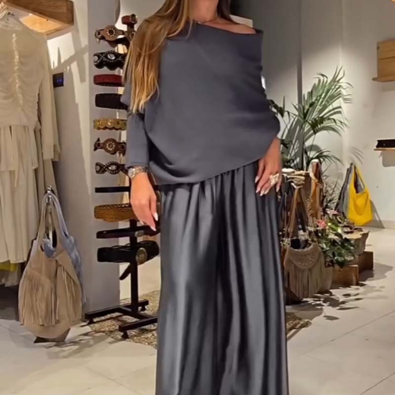 Elegáns, váll nélküli felső és bő szárú szatén nadrág, kétrészes szett