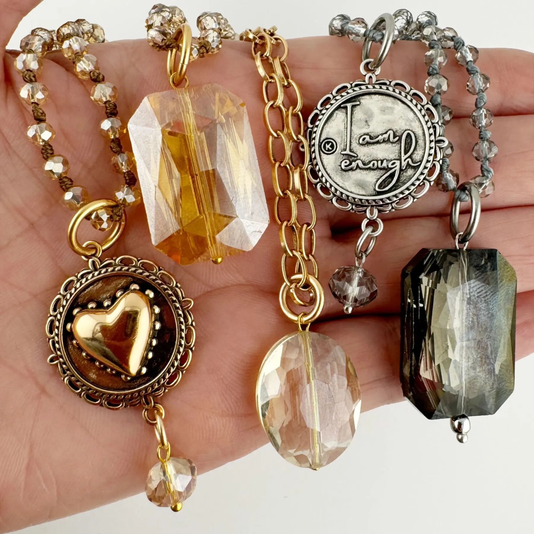 Set di collane con cuore e pietre preziose