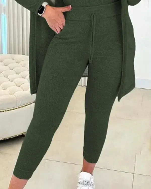 Női kerek nyakú trikó és húzózsinóros nadrág szett kabáttal