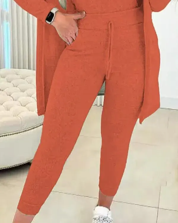 Női kerek nyakú trikó és húzózsinóros nadrág szett kabáttal