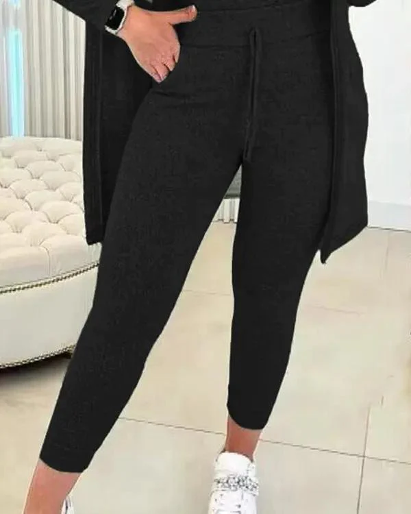 Női kerek nyakú trikó és húzózsinóros nadrág szett kabáttal