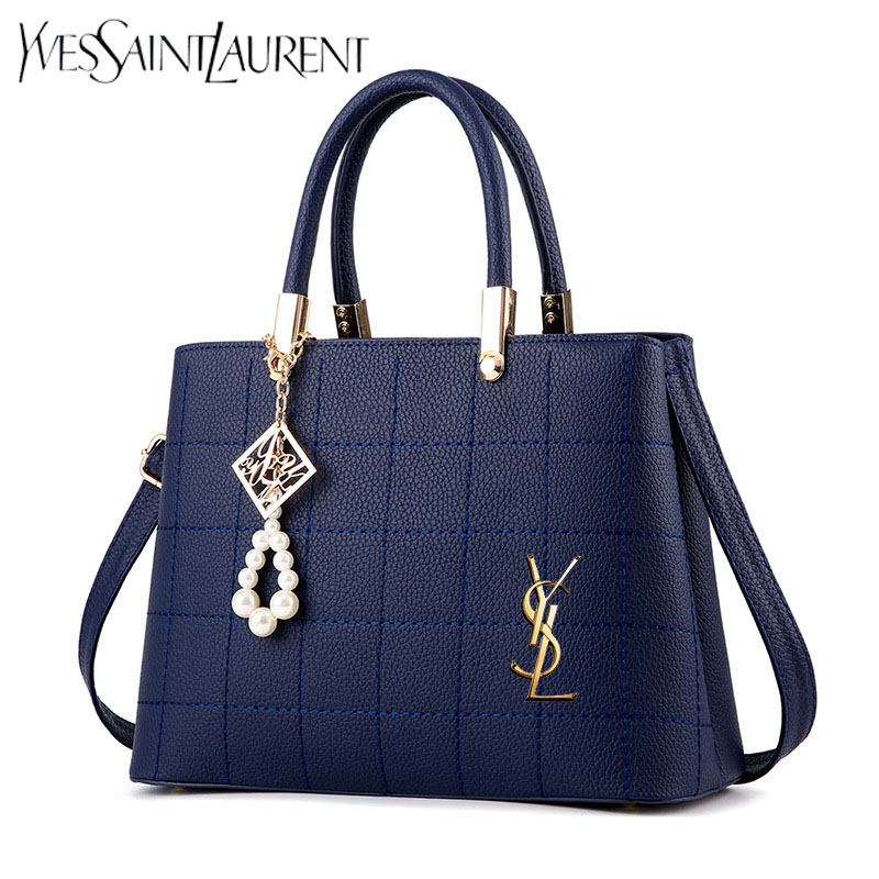 The new YSL® checkered women's shoulder bag
