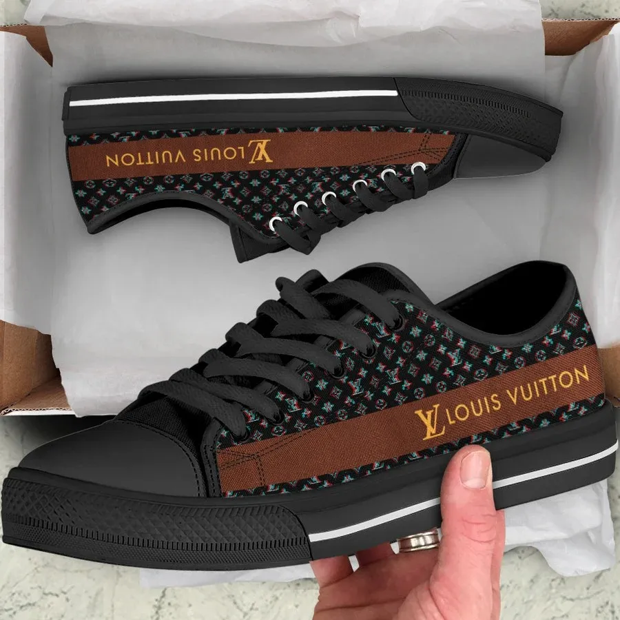 Zapatos bajos de lona negros de lujo.
