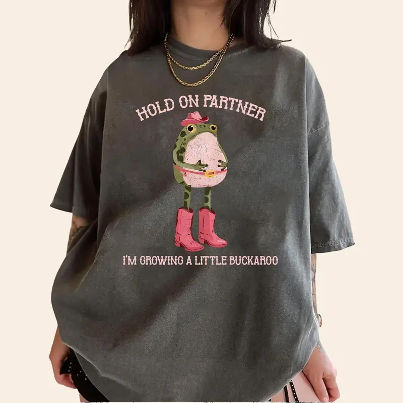 “Maternity Whimsy” Cowgirl Frog Pregnancy Announcement Tee
