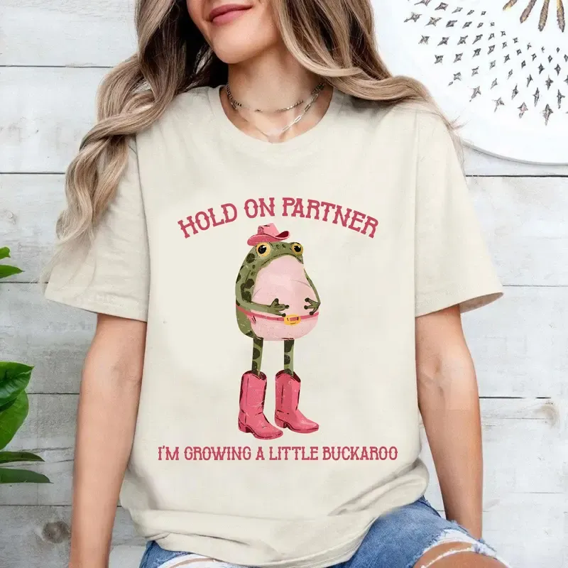“Maternity Whimsy” Cowgirl Frog Pregnancy Announcement Tee