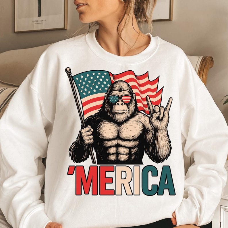 T - Shirt with a Fun Twist: Iconic Bigfoot Figure Holding Flag