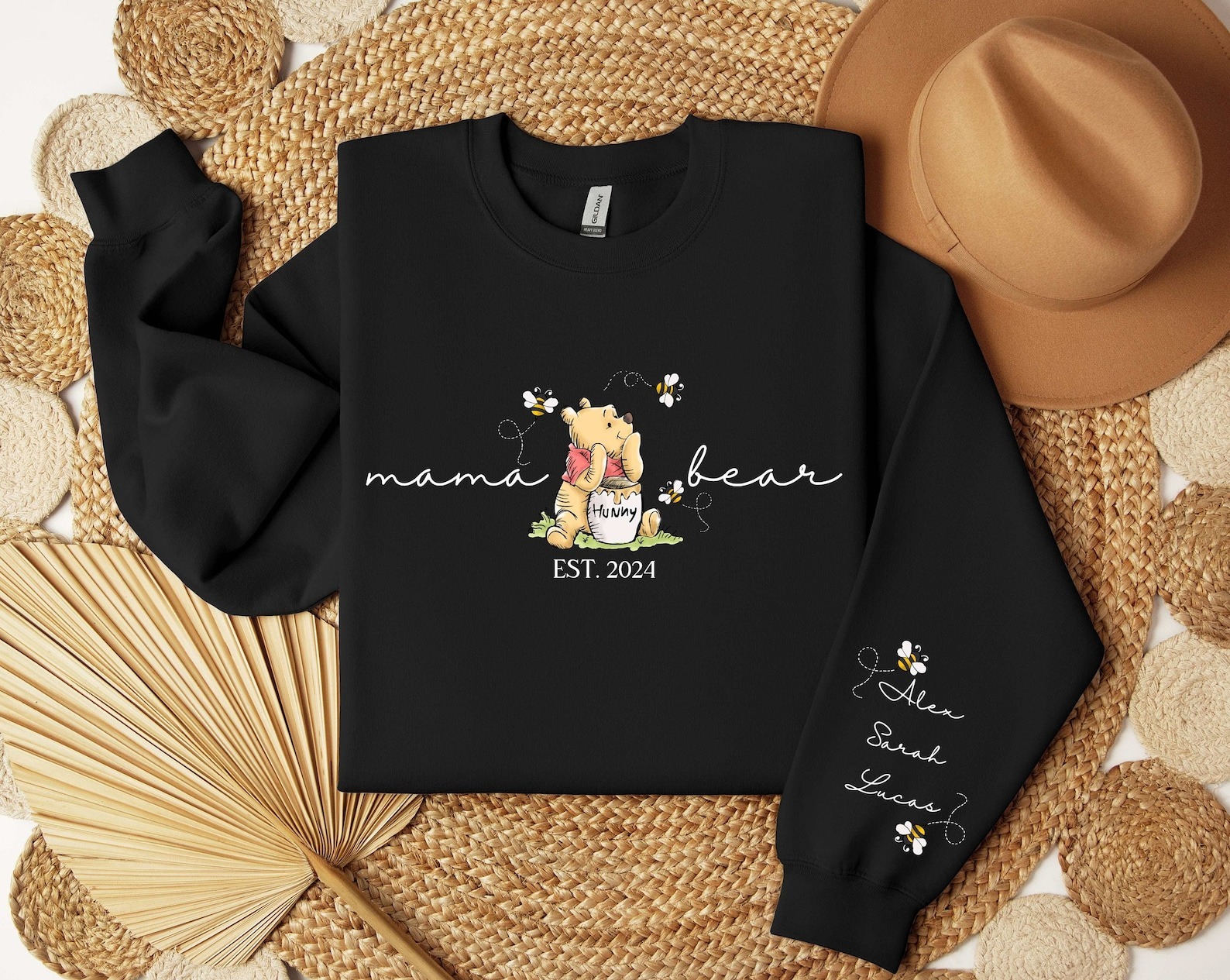 Custom mama sweatshirt with her kids name printed on sleeve and her est year