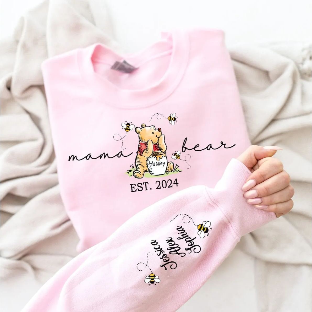 Custom mama sweatshirt with her kids name printed on sleeve and her est year