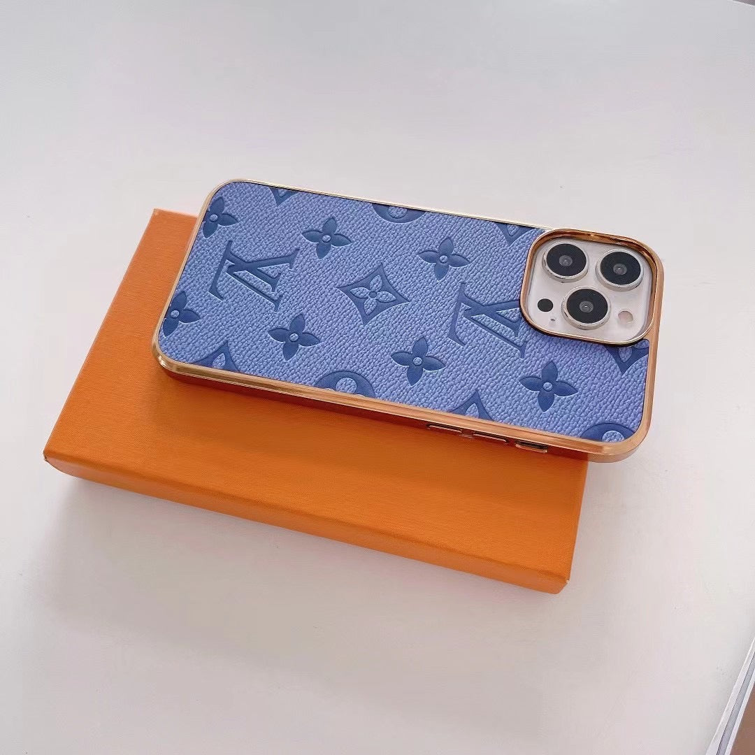 Stylish woman holding an iPhone with a trendy luxury case, showcasing modern fashion trends for 2025.