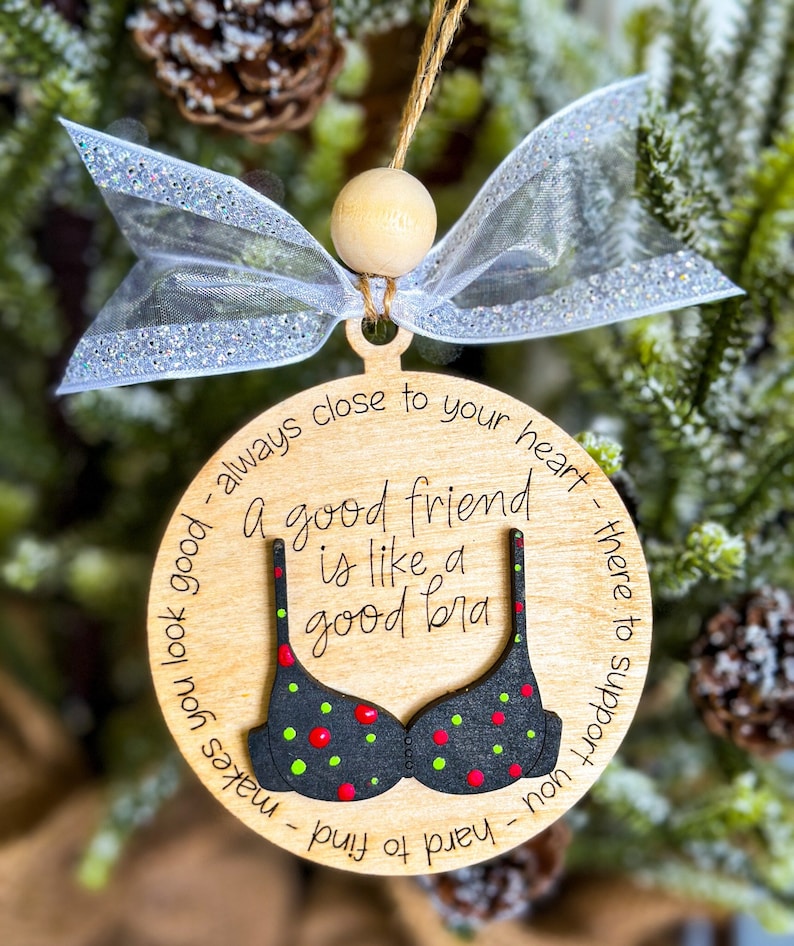 Ornament that says A good Friend is Like A Good Bra
