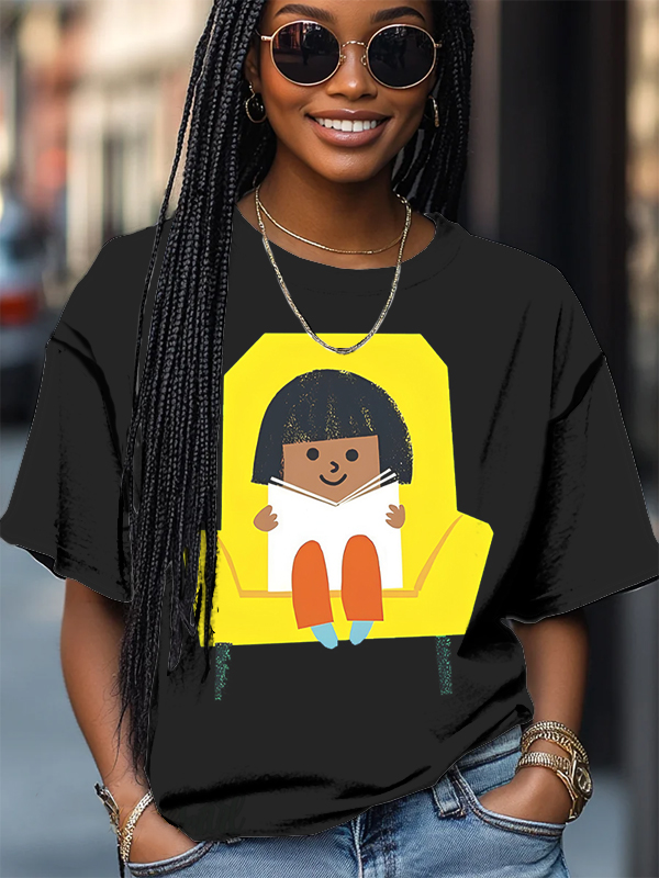 Women's Little Girl Sitting On The Sofa And Reading A Book Art Print Casual T-Shirt-Styleame