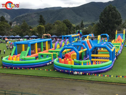 50mL Giant Running Tunnel Big Inflatable Obstacle Course Bounce House For Outdoor fun play