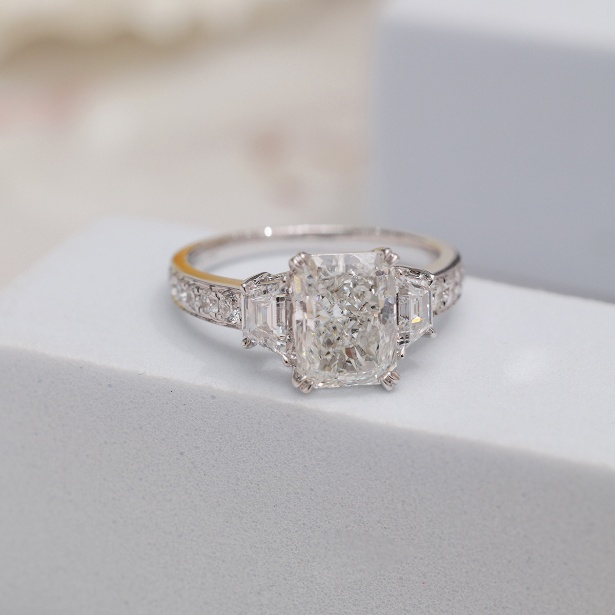 2 Carat Center Stone Radiant Cut Lab Grown Diamond Three Stone Channel  Band Engagemnet Ring (2.8 Ct Tw)-Light Mark
