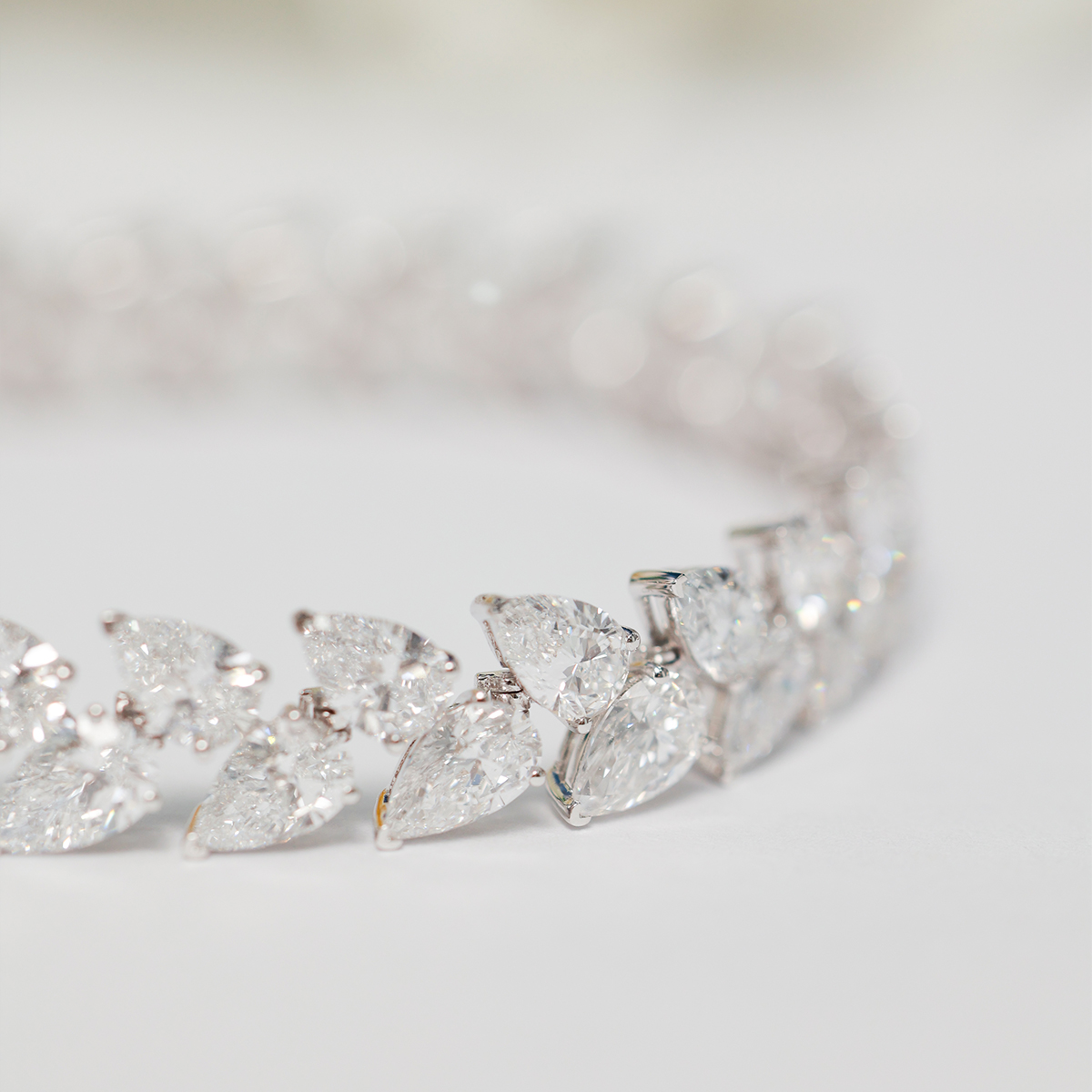 21.6 Carat Total Weight Pear Cut Lab grown Diamond Wreath and Leaf Garland Bracelet-Light Mark