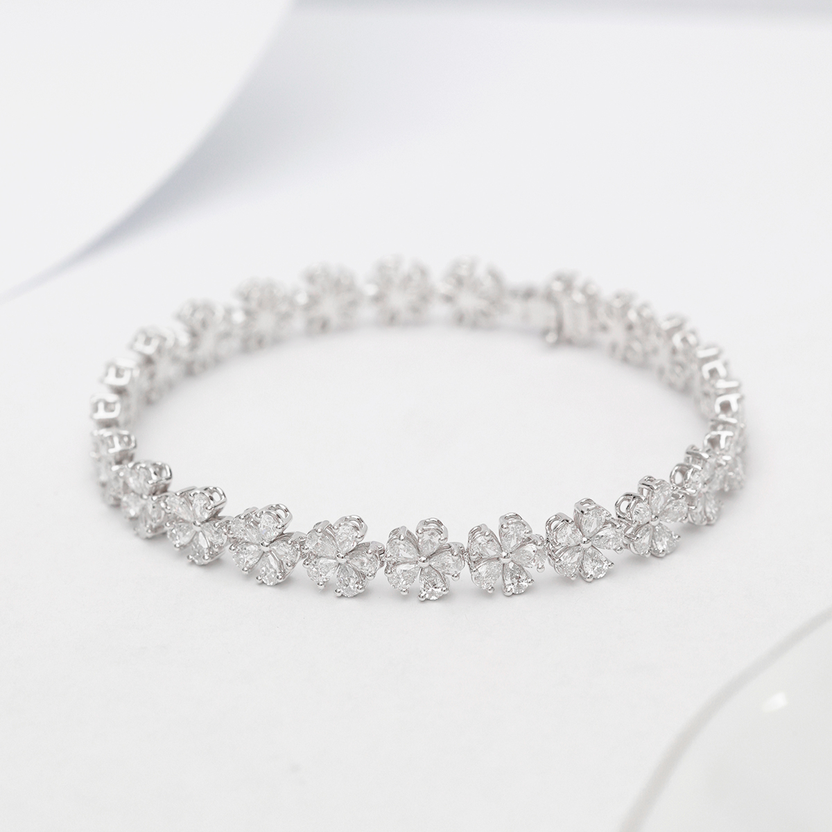 5.9 Carat Total Weight Five Petal Pear Cut Lab Grown Diamond Floral Tennis Bracelet-Light Mark