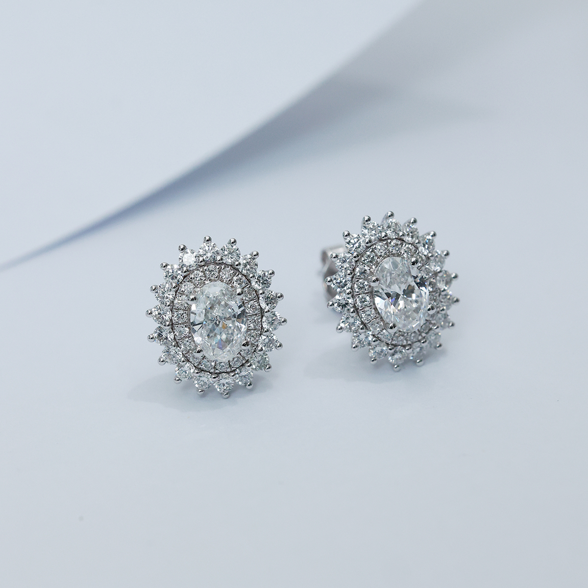1.8 Carat Total Weight Double Halo Oval Cut Lab Grown Diamond Stud Earrings in 18k White Gold