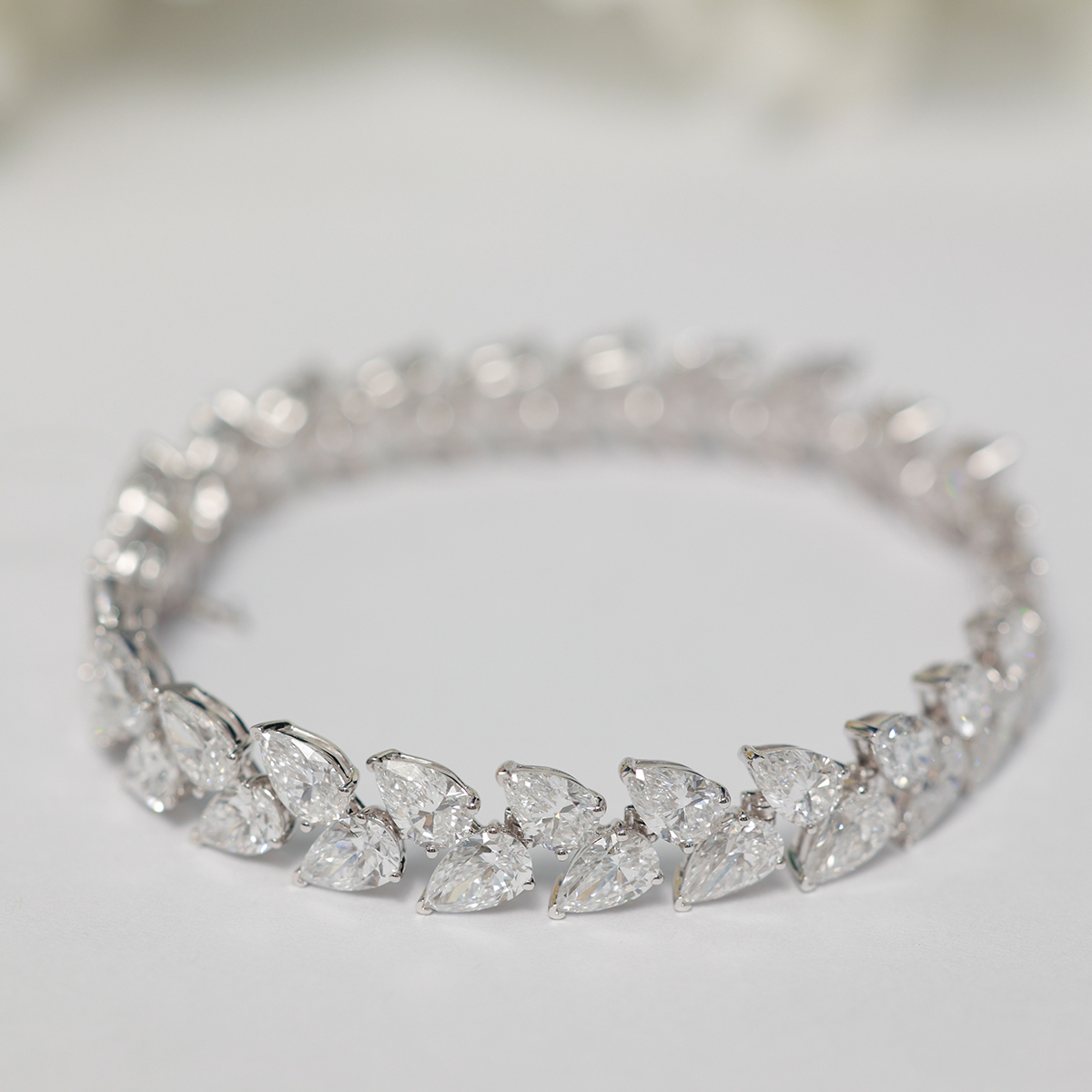 21.6 Carat Total Weight Pear Cut Lab grown Diamond Wreath and Leaf Garland Bracelet-Light Mark