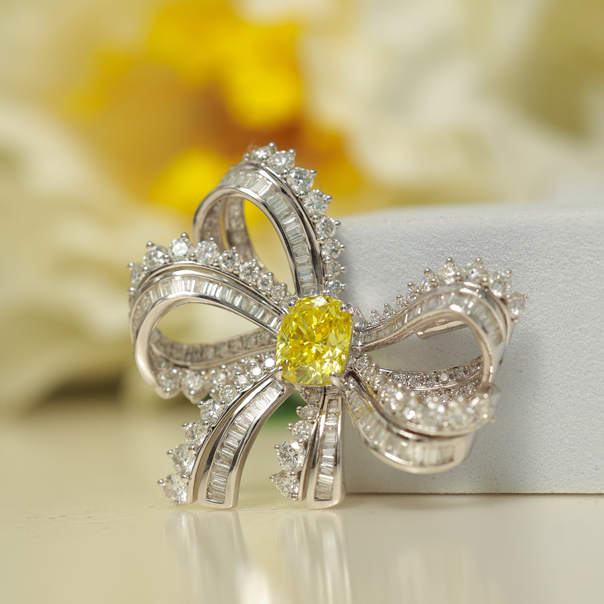 2 Carat Center Stone Yellow Cushion Cut Lab Grown Diamond with White Baguette Diamond Ribbon Bow Brooch (5.2 Ct Tw)-Light Mark