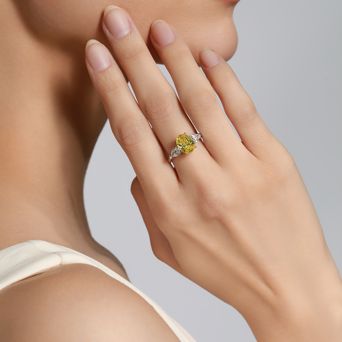 2.4 Carat Center Stone Yellow and White Oval Cut Three Stone Lab Grown Diamond Engagement Ring (3 Ct Tw)-Light Mark