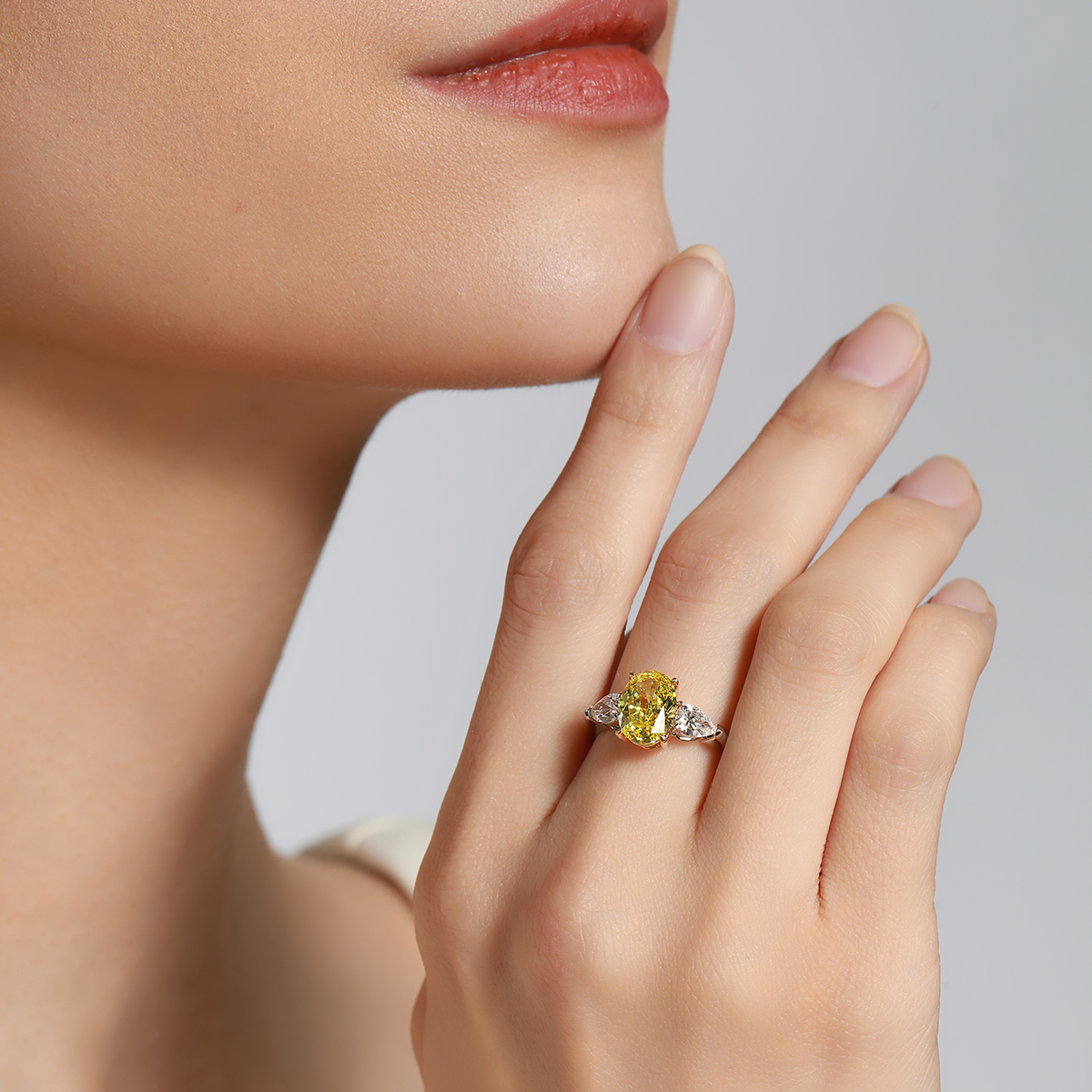 2.4 Carat Center Stone Yellow and White Oval Cut Three Stone Lab Grown Diamond Engagement Ring (3 Ct Tw)-Light Mark