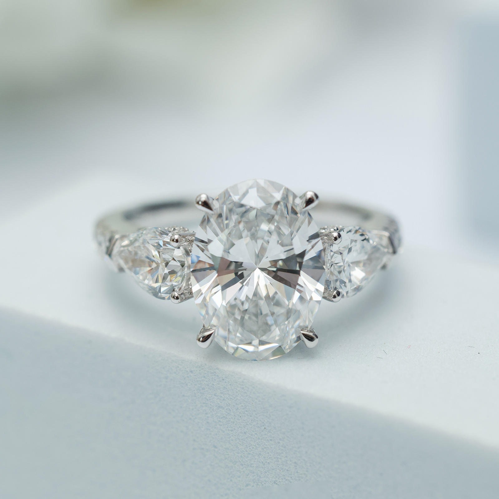 3 Carat Center Stone Oval Cut Three Stone Lab Grown Diamond Hidden Halo Engagement Ring  (4.9 Ct Tw)-Light Mark