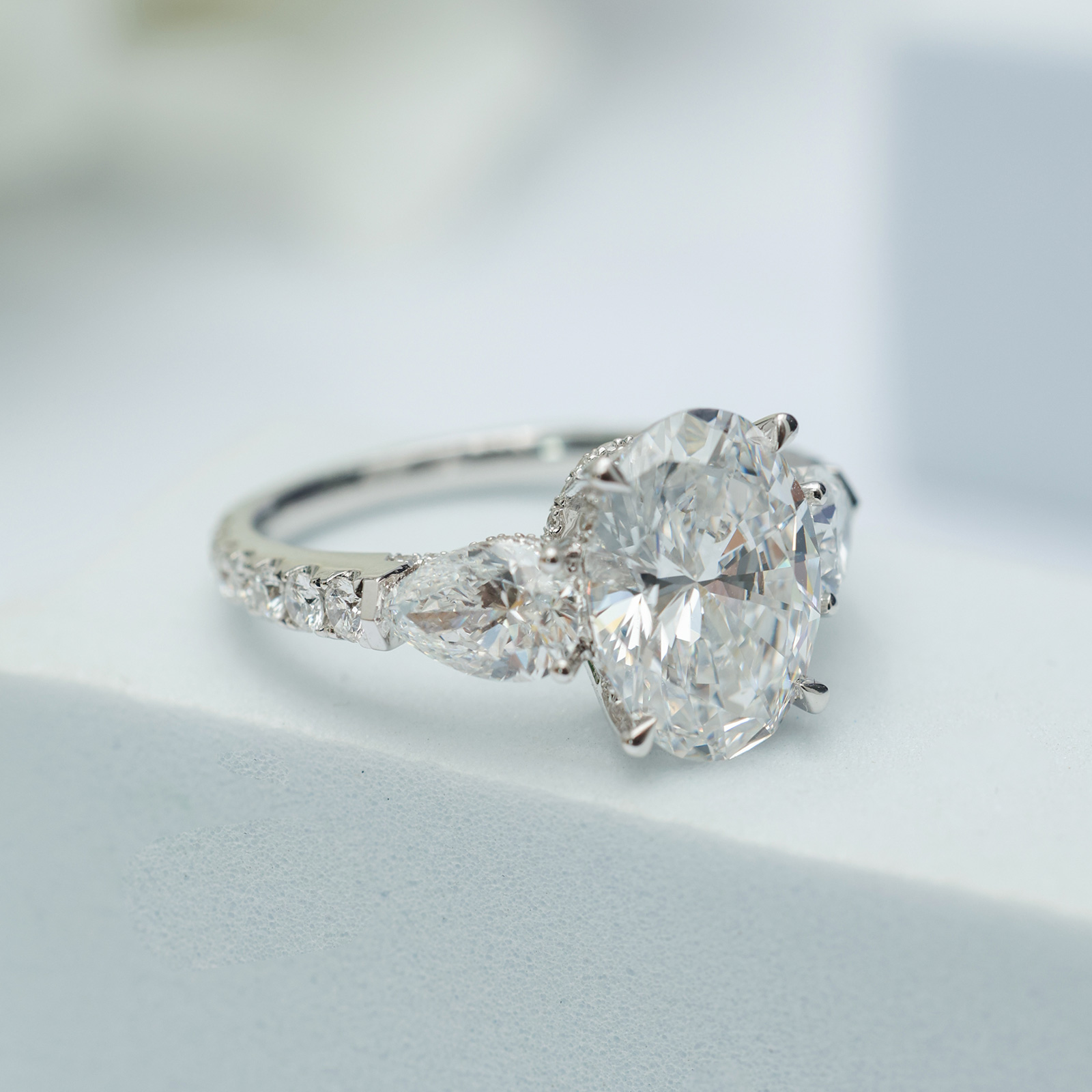 3 Carat Center Stone Oval Cut Three Stone Lab Grown Diamond Hidden Halo Engagement Ring  (4.9 Ct Tw)-Light Mark