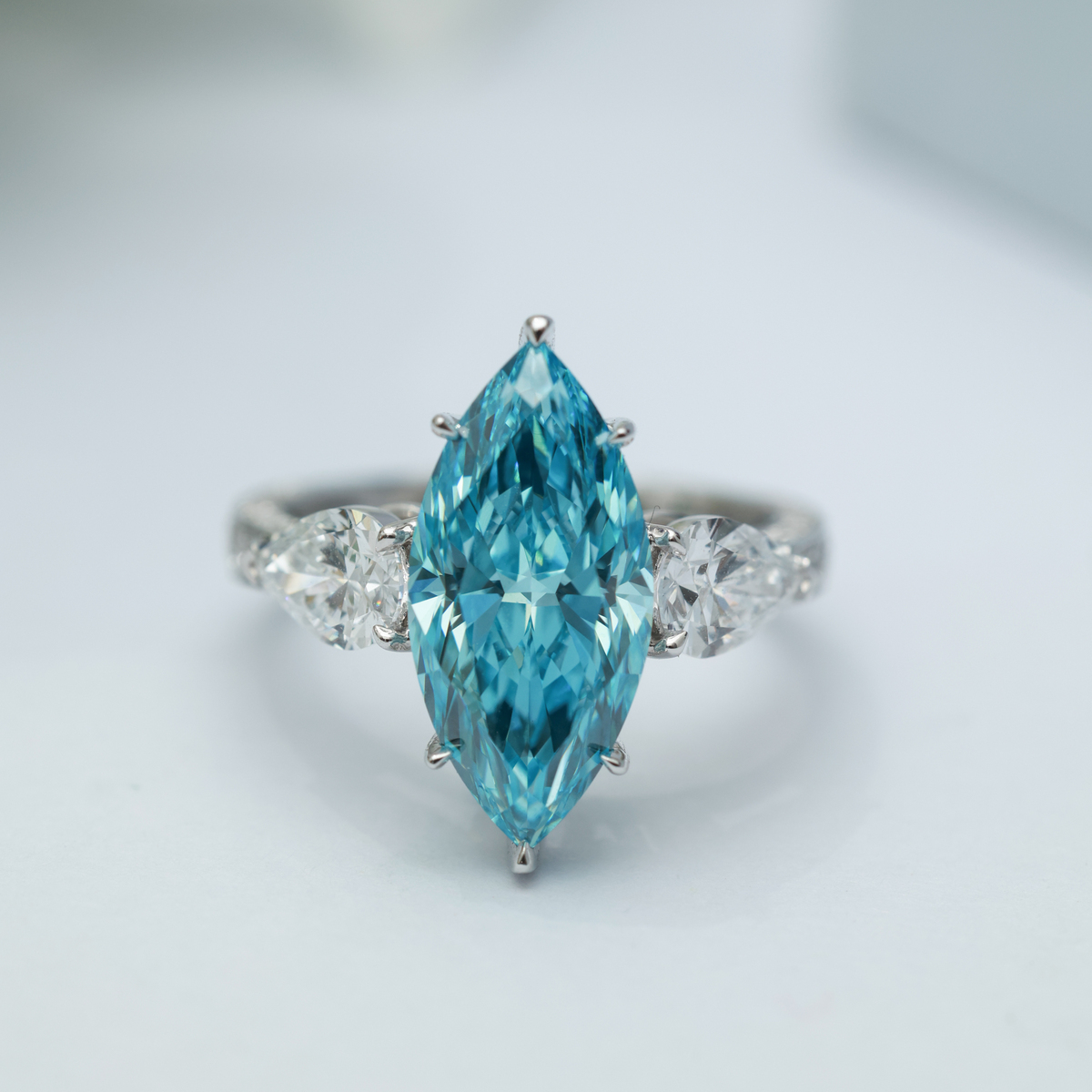 3.7 Carat Center Stone Luxe Blue Marquise Cut Lab Grown Diamond Three Stone Engagement Ring (5 Ct Tw)-Light Mark
