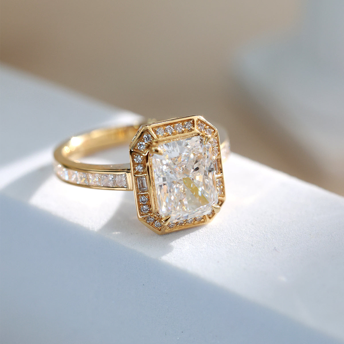 2.6 Carat Center Cushion Cut Lab Grown Diamond Bezel set ennagement ring in 18k yellow gold (3 Ct Tw), VS, IGI Certified