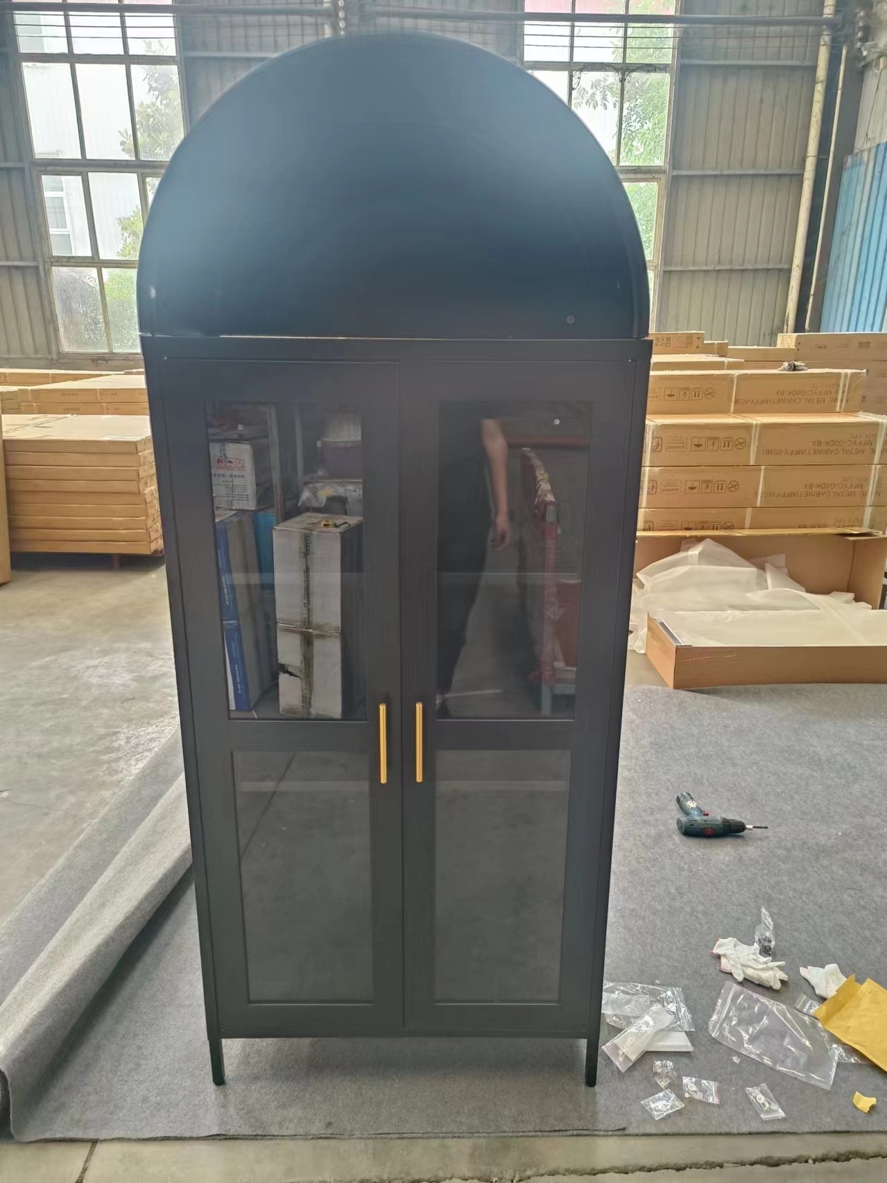Arched cabinet with open doors