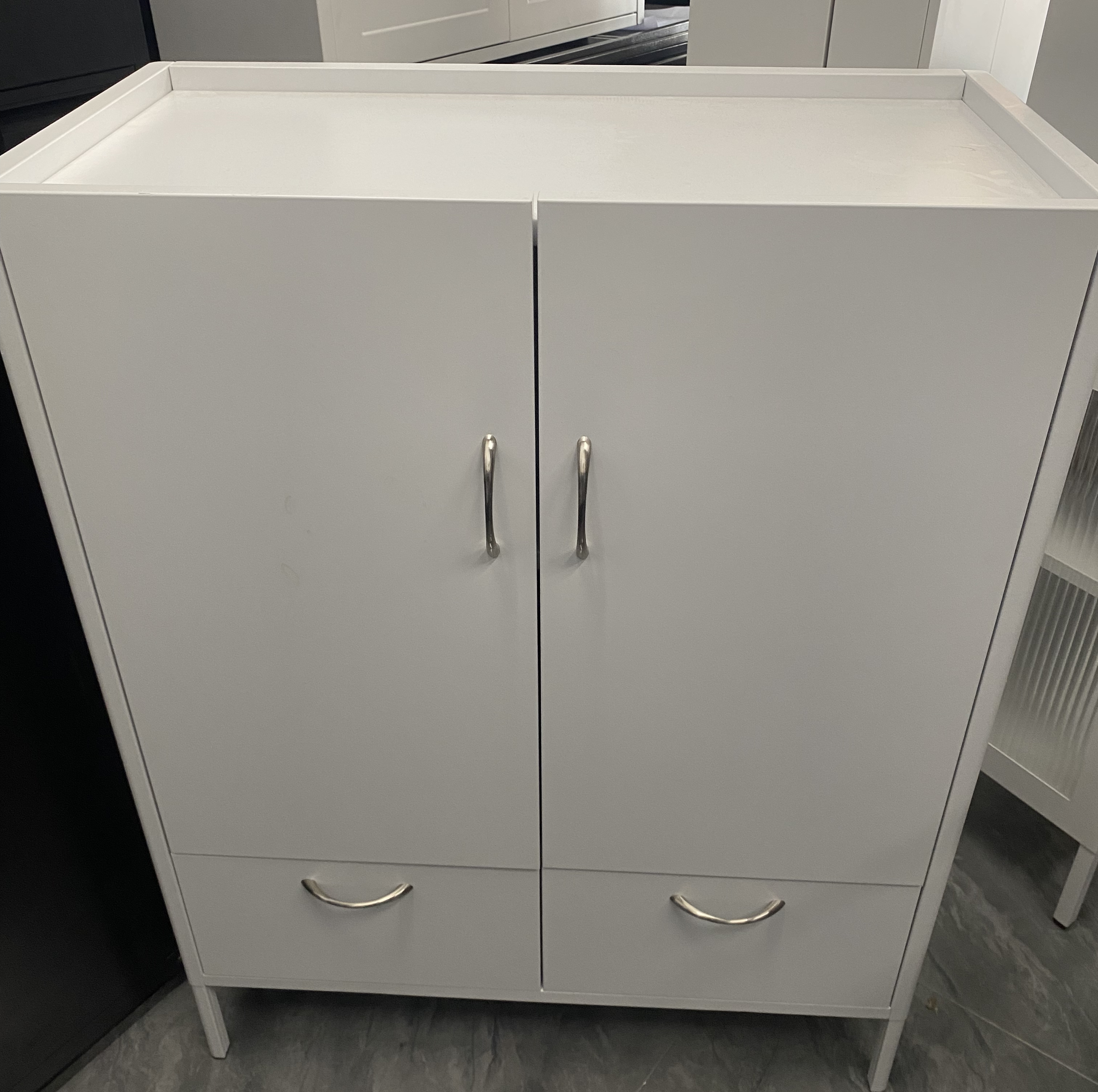 Opposite to the second pumping station foot low cabinet White