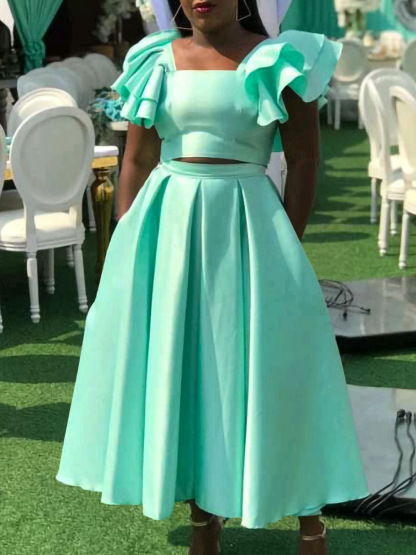 New solid color ruffled collar top with large skirt hem and skirt set