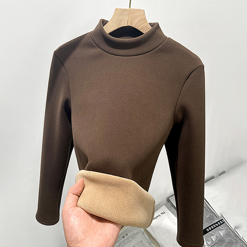 Layered with a half high neckline slim knit bottom sweater and plush warm top