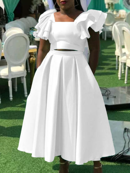 New solid color ruffled collar top with large skirt hem and skirt set