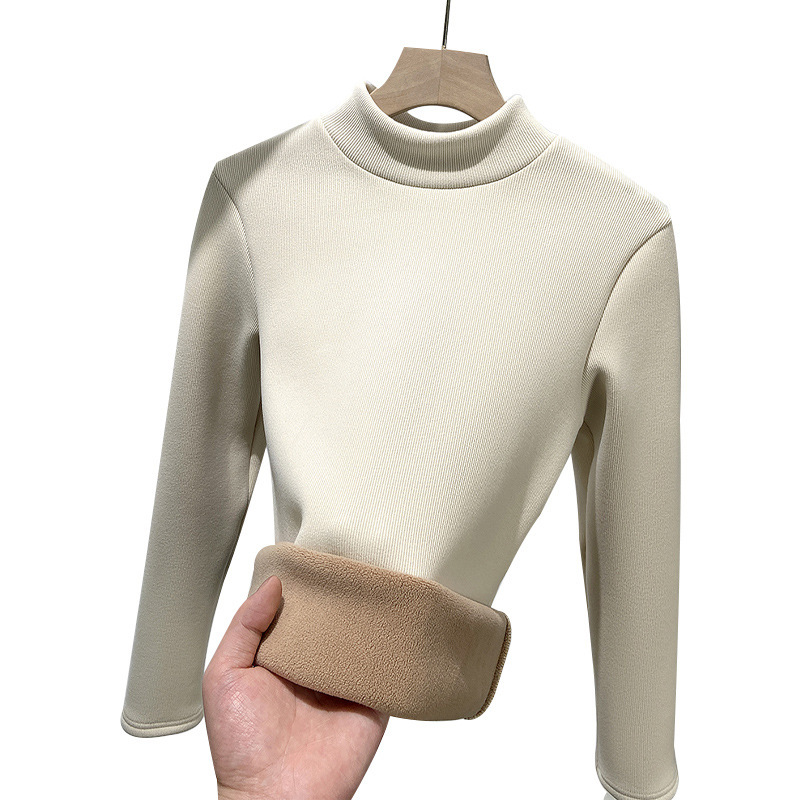 Layered with a half high neckline slim knit bottom sweater and plush warm top