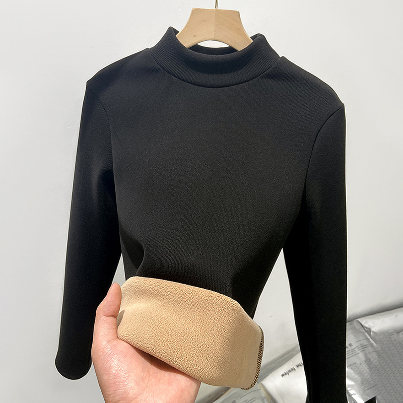 Layered with a half high neckline slim knit bottom sweater and plush w