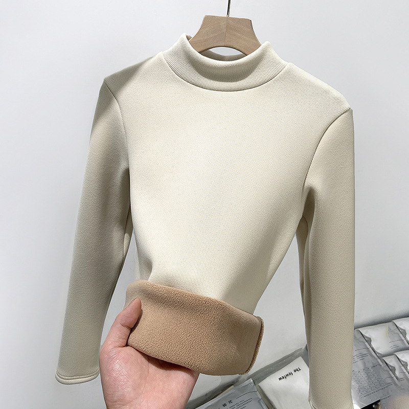Layered with a half high neckline slim knit bottom sweater and plush warm top
