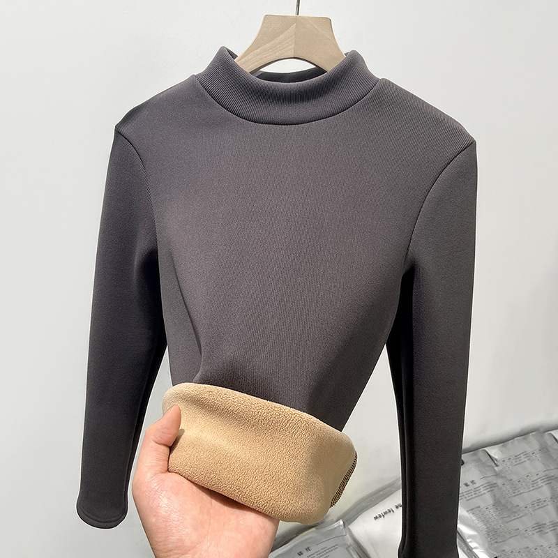 Layered with a half high neckline slim knit bottom sweater and plush warm top