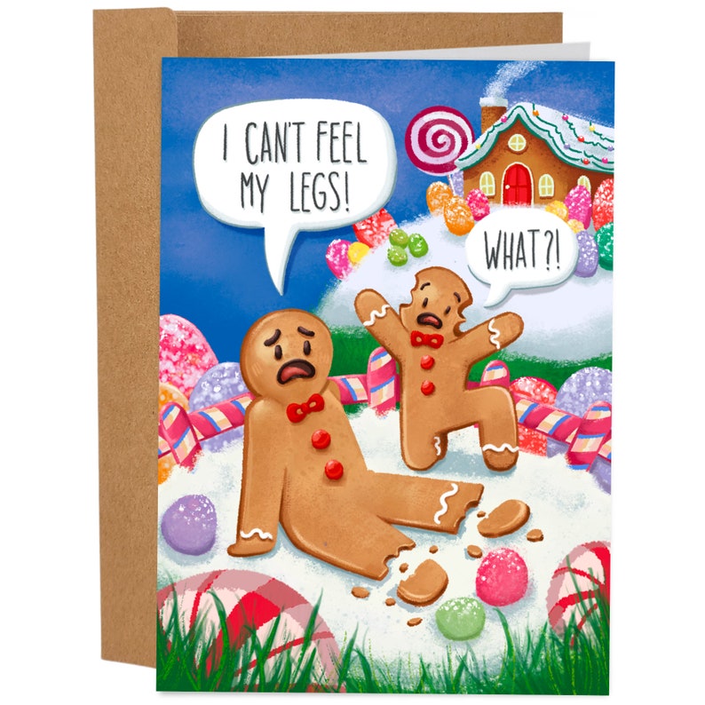 May include: Humorous Christmas card featuring two gingerbread men. One gingerbread man is broken and says, 'I can't feel my legs!' The other gingerbread man replies, 'What?!' The scene is set against a whimsical background of candy and a gingerbread house. The card is predominantly blue, brown, and various candy colors.