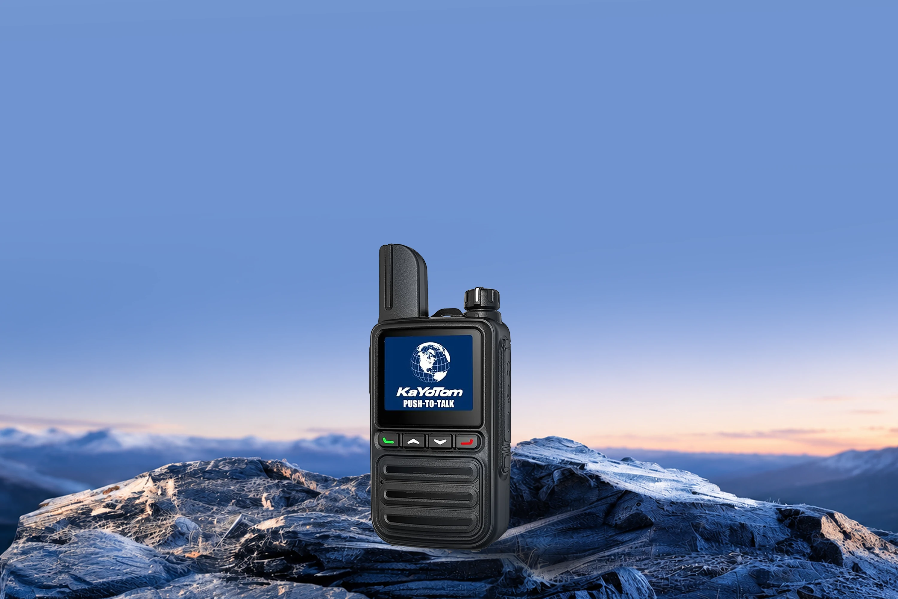 KayoTom G08 black rugged two-way radio showcased against a sunset mountain and rock landscape