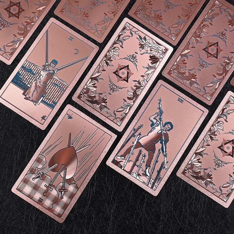 Front view of Neo Rider Tarot Deck with rose gold and black design