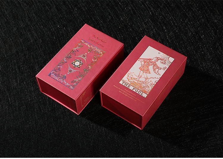 Front view of Neo Rider Tarot Deck with rose gold and black design
