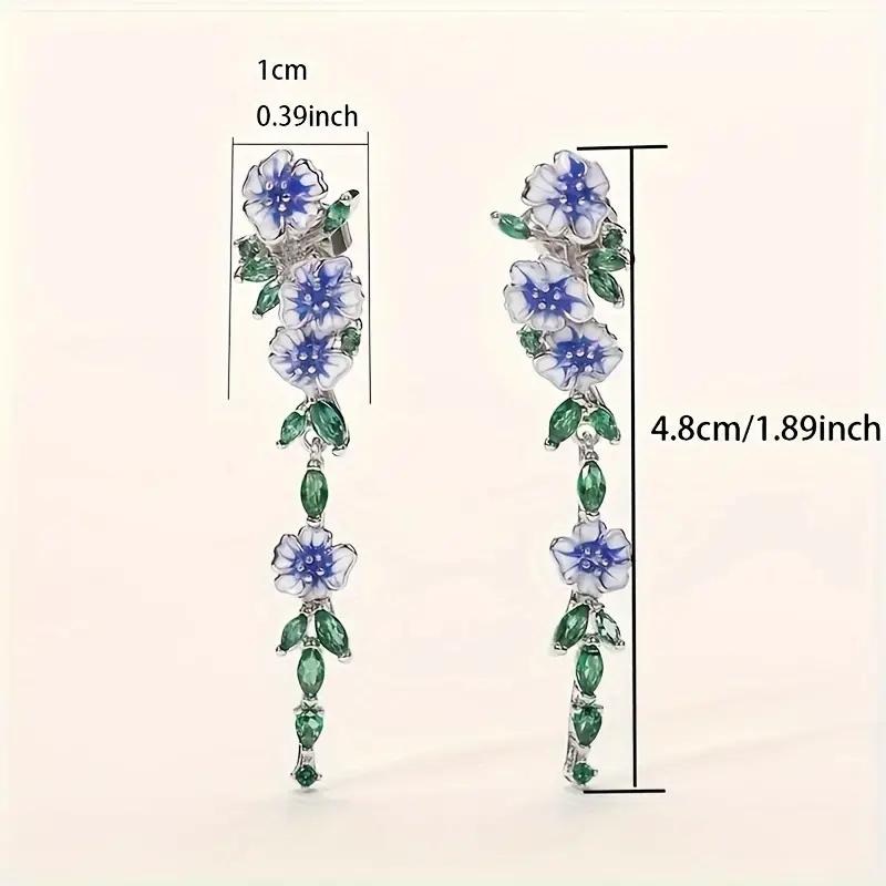 Delicate enamel floral design long drop earrings