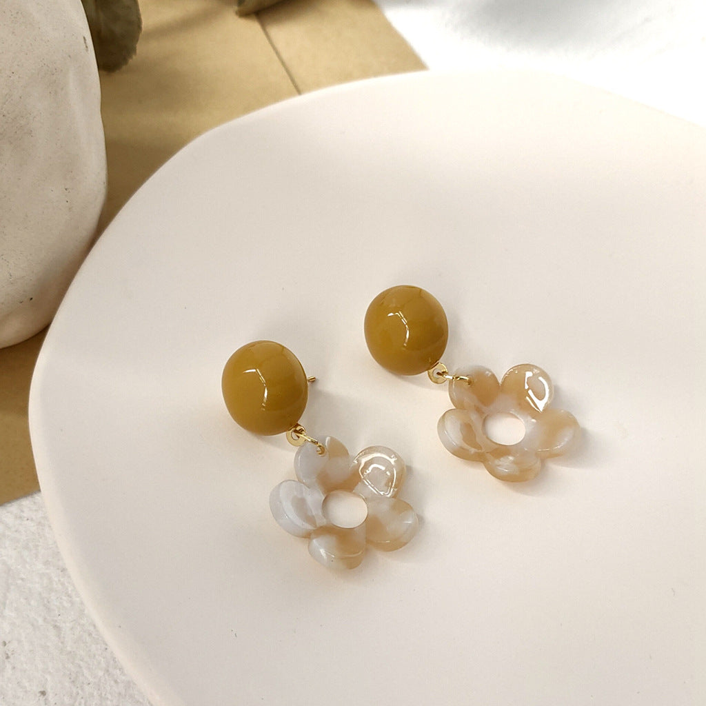 Resin hollow plum blossom earrings-canovaniajewelry