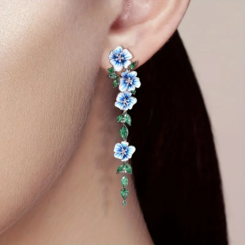 Delicate enamel floral design long drop earrings