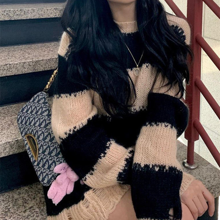 Loose black and white knitted sweater